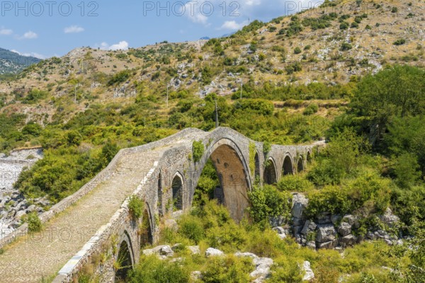 Aerial view of the Old Mes bridge near Shkoder. Albania, Europe. Ottoman stone arch bridge Ura e