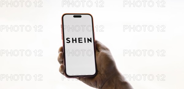 Dhaka, bangladesh- 26 Nov 2024: Shein logo is displayed on smartphone.Shein is a fast fashion