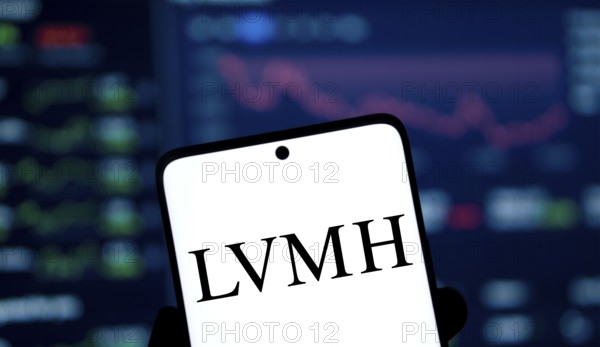 LVMH logo is displayed on smartphone