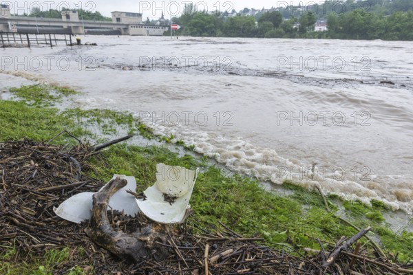Symbolic image extreme weather, global warming, climate change, environmental pollution, plastic