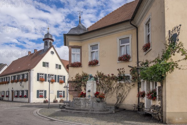 Klingenmünster with the August Becker Monument, on the left the birthplace of the writer August