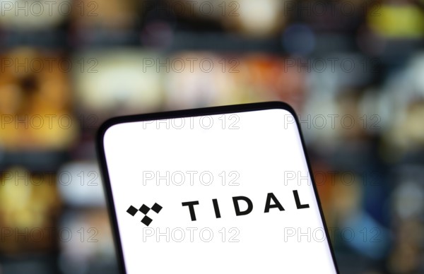 Tidal logo is displayed on smartphone. Tidal is a Norwegian-American music streaming service