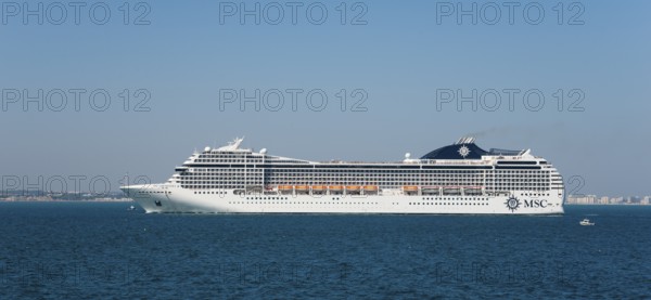 Large cruise ship on open sea with clear sky, MSC cruise ship, MSC Orchestra, Cádiz, Cadiz,