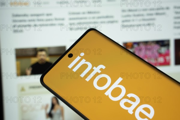 Dhaka, Bangladesh - 17 March 2025: The logo of the newspaper infobae is displayed on a smartphone