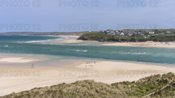 View from Hayle Sands to Hayle Beach and Riviere Towans Beach and some houses. sandy beach beach,