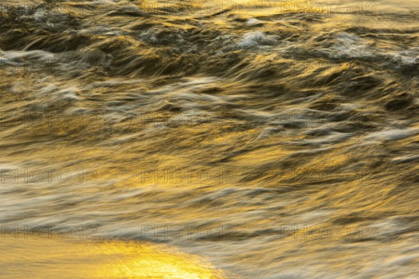 Waves at sunset on the west beach of Fischland-Darß-Zingst, Baltic Sea, Ahrenshoop,