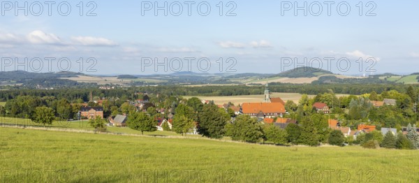 View of the village from the Sängerhöhe with church, school and half-timbered houses, in the