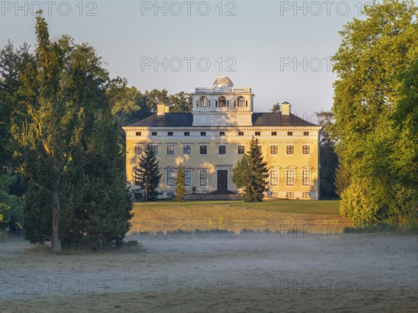 Wörlitz Castle in Wörlitz Park in the morning with fog, Garden Kingdom Dessau-Wörlitz, Wörlitz,