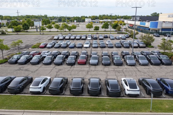 Farmington Hills, Michigan USA - 30 May 2025 - Many dozens of unsold Tesla electric vehicles,