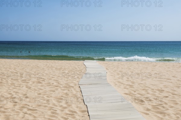Sandy beach beach and blue sea, Spiaggia di Su Portu, Torre di Chia, Chia, south coast, Sardinia,