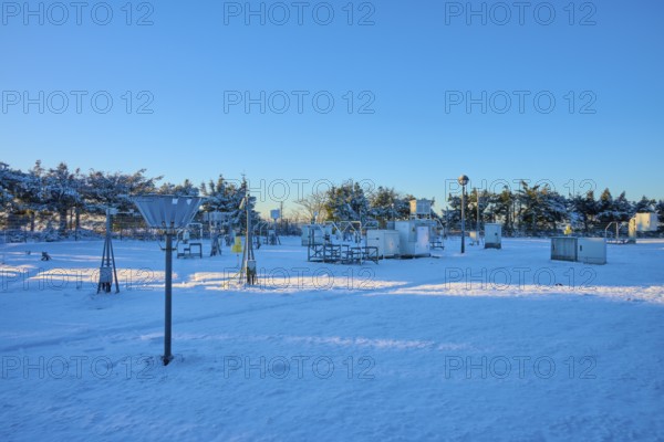 Snow-covered weather station with technological devices, blue sky, winter, Wasserkuppe, Gersfeld,