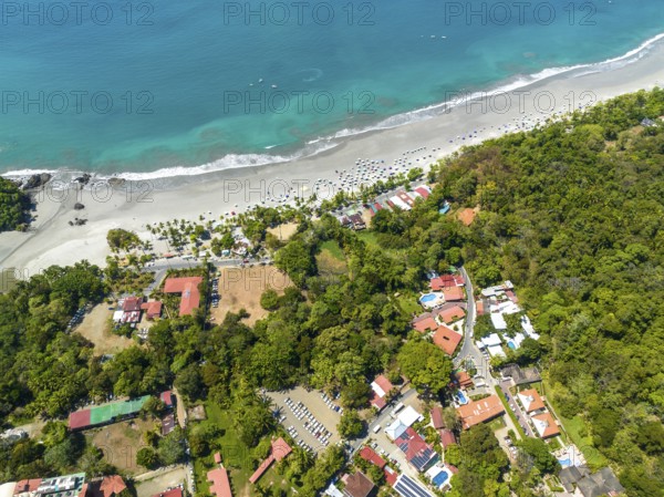 Aerial view, coast and town, Corrohoe Bay and Playa Espadilla, Manuel Antonio National Park,