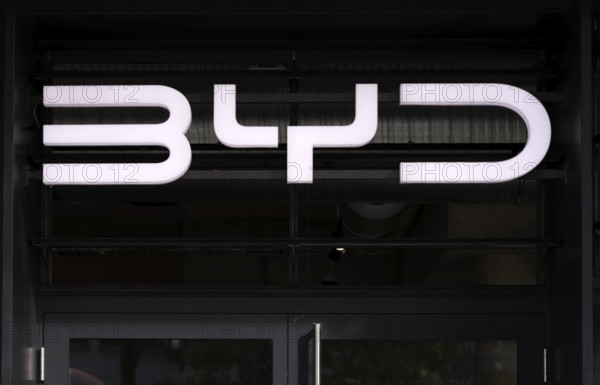 Logo in front of showroom, sales exhibition of the car brand BYD Build Your Dreams, e-vehicles,