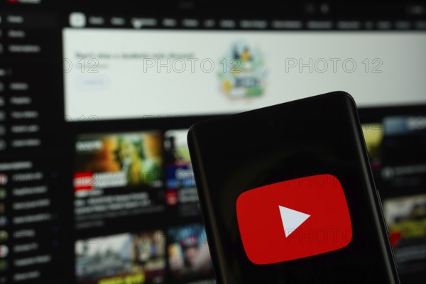 Dhaka, Bangladesh- 10 July 2025: Youtube logo is displayed on a smartphone screen, with the website
