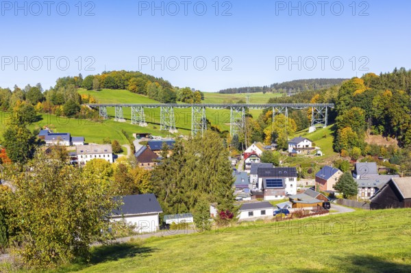 Town view with Markersbach viaduct, historic metal railway bridge in Raschau-Markersbach,