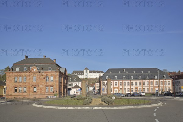 Former royal Bavarian rent office built in 1902 and baroque town hall built in 1775 with view of
