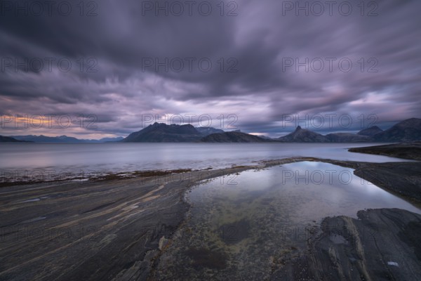 The Vestfjord in Nordland, Norway, offers a dramatic atmosphere near Bodø. Dark clouds are