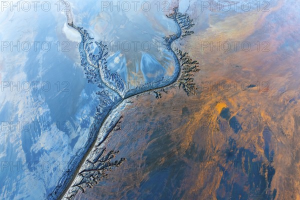 An entrancing abstract fractal piece showcasing intricate patterns and vivid color contrasts. The