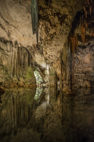 Huge stalactites and underground lake, stalactite cave Grotta di Nettuno, Neptune Grotto, Capo