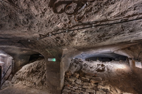Remaining rubble from World War II in the historic rock cellars, laid out in the 17th century,