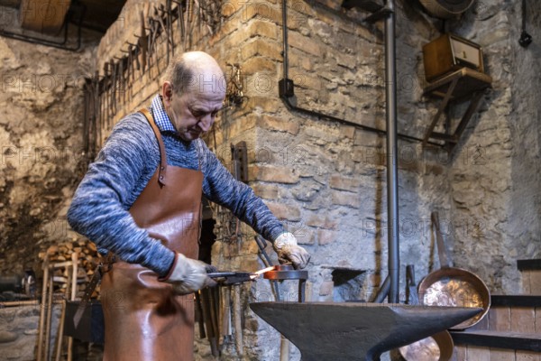 An elderly blacksmith in Austria's Salzburg region maintains the centuries-old traditions of his