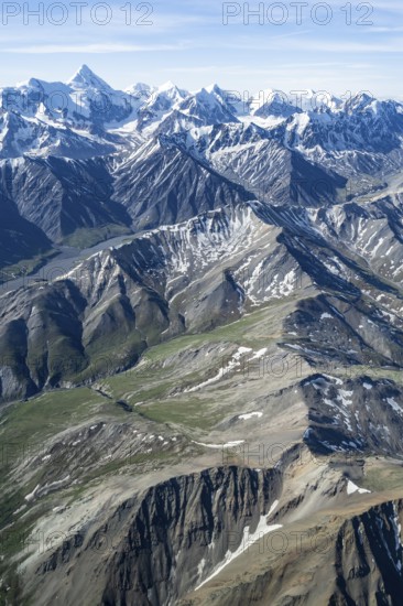Snow and ice, epic mountains with glaciers, aerial view, Alaska Range, Denali National Park,