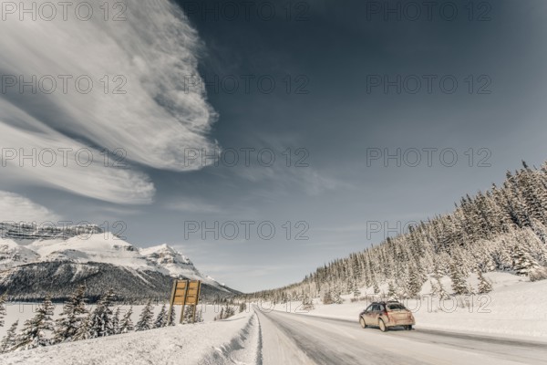 Winter road trip on the Icefields Parkway with lots of snow and ice, Banff National Park, Jasper