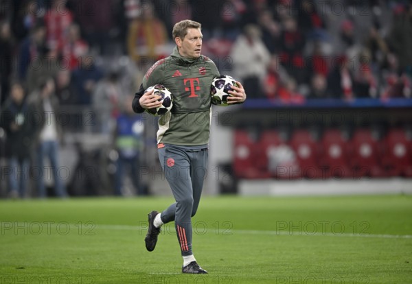 Goalkeeper coach Michael Rechner FC Bayern Munich FCB with Adidas Derbystar matches under his arm,