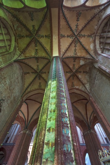 Fabulously painted pillars and vaults in St Nicholas' Church, late Gothic brick building, built
