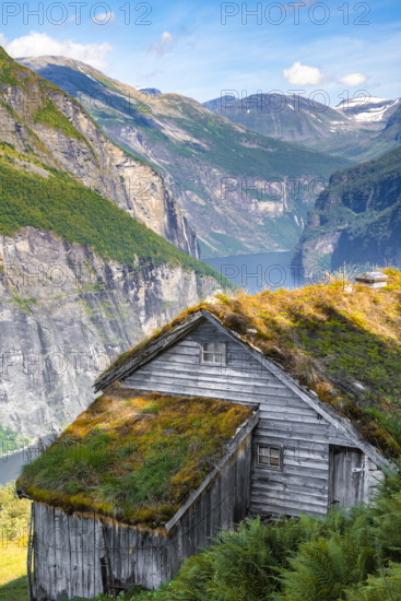 Blomberg Gård, historic mountain farm on steep mountainside, Geirangerfjord, near Geiranger, Møre