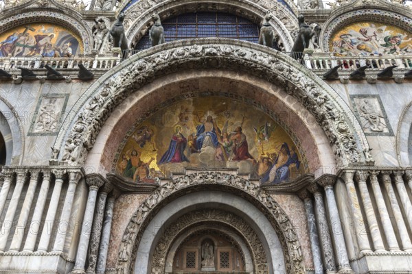 Entrance portal with mosaic of the Basilica di San Marco, built in the 11th century, Venice,