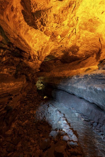 Underground cave formed by lava flow, illuminated lava tunnel, Cueva de los Verdes, Lanzarote,
