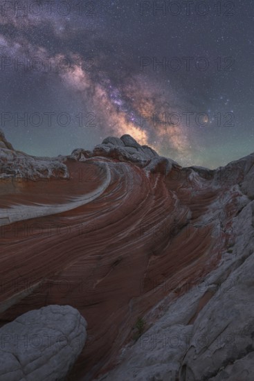 Stunning nightscape of White Pocket in Arizona, USA, with the Milky Way galaxy beautifully