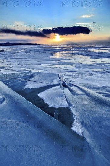Sunset on ice, Lake Baikal, Olkhon Island, Pribaikalsky National Park, Irkutsk Province, Siberia,