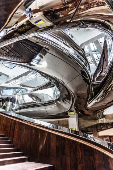 Spectacular double spiral staircase from ground floor to roof terrace, offering breathtaking views