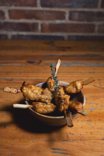Juicy chicken tenderloin skewers, lightly seasoned and infused with aromatic herbs, presented on a