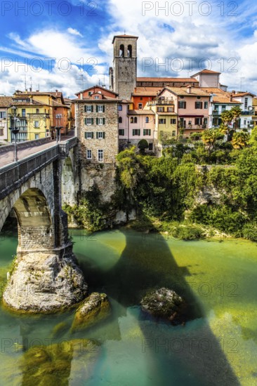 Ponte del Diavolo from the 15th century leads over the Natisone river into the historic centre,