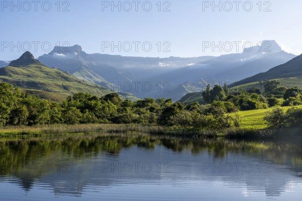 Amphitheatre with reflection in the lake, Royal Natal National Park, Drakensberg Mountains south,