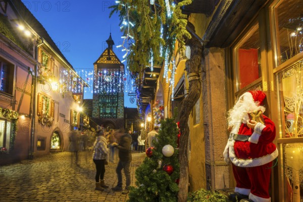 Colour-illuminated and Christmassy decorated half-timbered houses, blue hour, Christmas market,