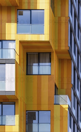 The vibrant and modern architecture in the suburbs, showcasing a mix of glass, concrete, and metal