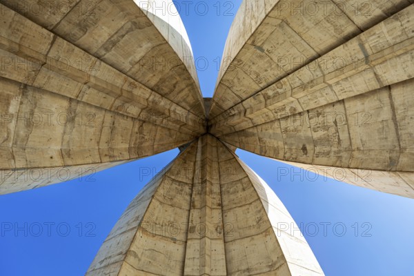 Symmetrical view of the concrete arches of a modern monument, The National Independence Monument in