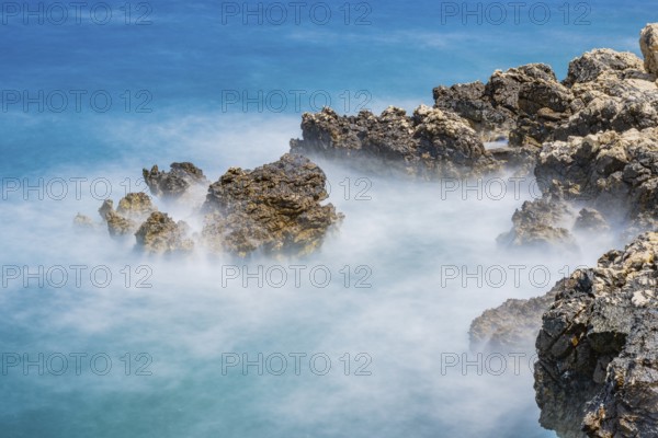 Romantic view over the sea in Koromacna Bay on a sunny day with rough seas on the island of Cres,