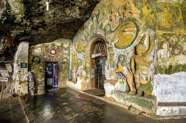 Walls of the cave with detailed paintings and sculptures that tell a spiritual story, The Diva