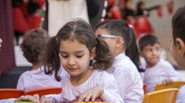 Children celebrate the 102nd anniversary of the Republic Day of Turkey, a national holiday