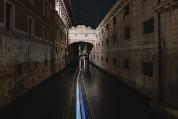 Serene nighttime beauty of Venice, Italy, with its stunning historic architecture gracefully