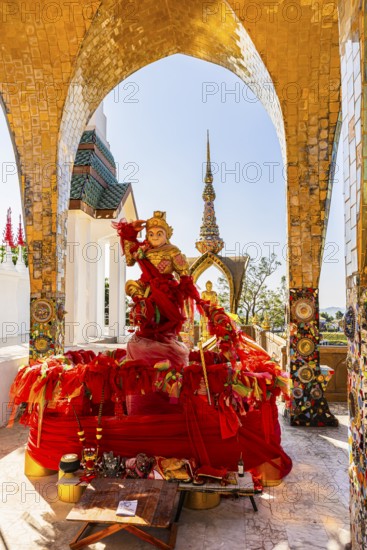 Round arch pavilions decorated with colorful mosaics and glass works of art, including a gilded