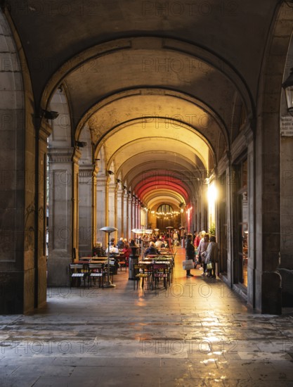 Restaurants in the arcades at Plaça Reial in Barcelona, Spain