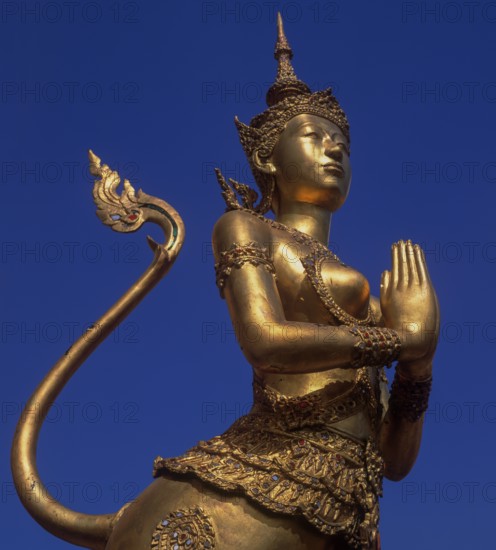 Wat Phra Kaeo, Temple of the Emerald Buddha, gilded statues of mythological creatures of the