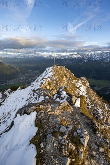 Summit cross at the summit of the Kramerspitz, at sunset, in autumn, Ammergau Alps, in autumn,