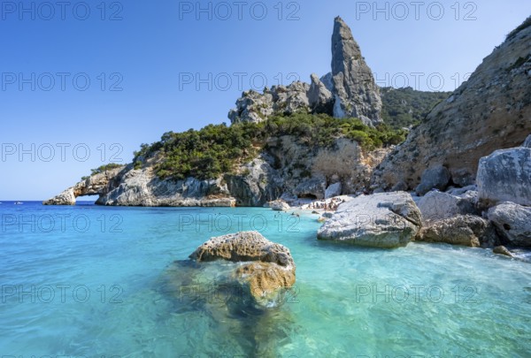 Light blue clear sea on a dream beach on Cala Goloritzé, picturesque rocky coast, steep coast with